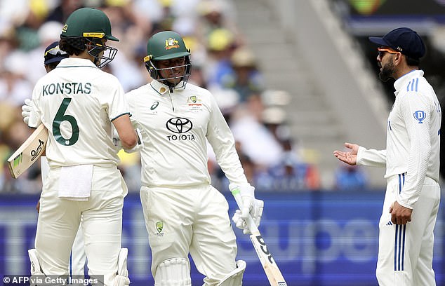 Kohli, 36, hit the debutant with his right shoulder between overs, and Konstas exchanged some angry words with the veteran before Usman Khawaja calmed the situation at the crease (pictured).