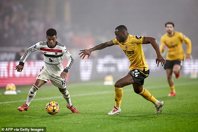 Amad Diallo (left) is working possibly harder than any Manchester United player for Amorim and was up and down like a tiger during the defeat at Molineux on Boxing Day.