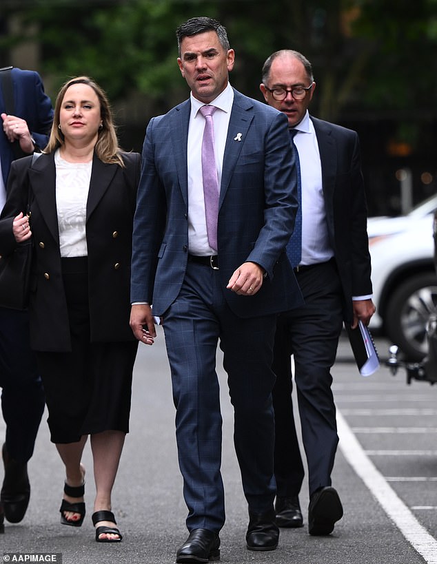 Brad Battin (centre) is the new leader of the Victorian opposition