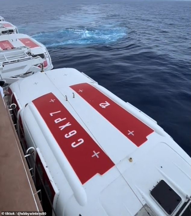 The boat was circling the area where flares were being fired to mark the ship's position when a man was first reported overboard.