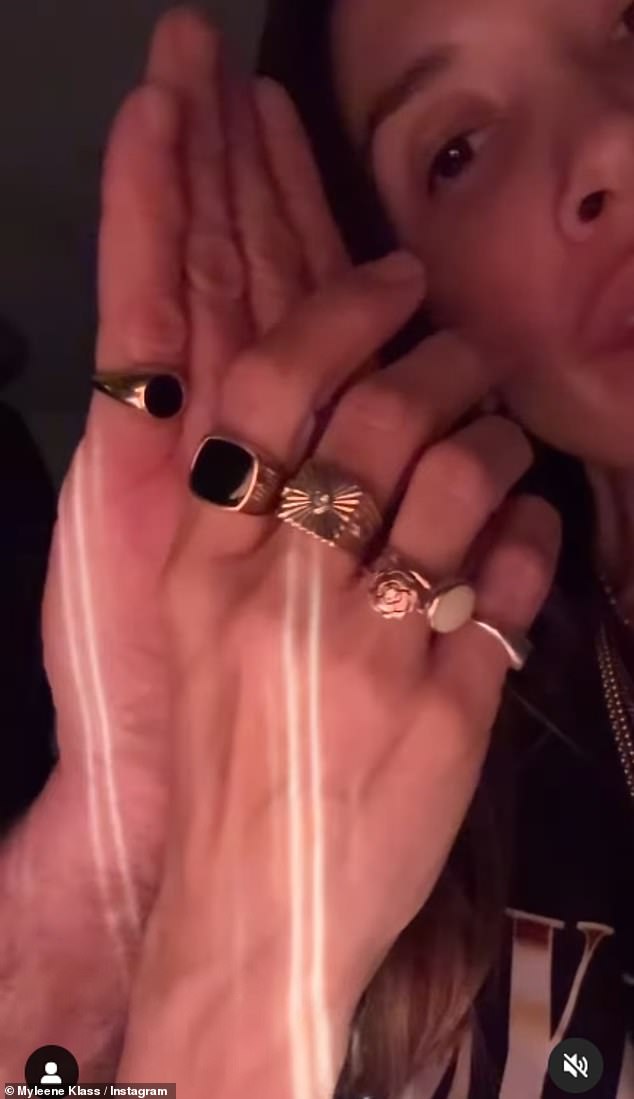 The rings featured an onyx gemstone and Myleene showed them off proudly.