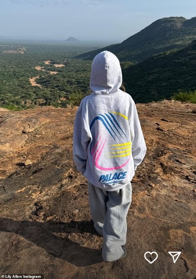 The singer shared a photo of her youngest daughter contemplating a stunning landscape.