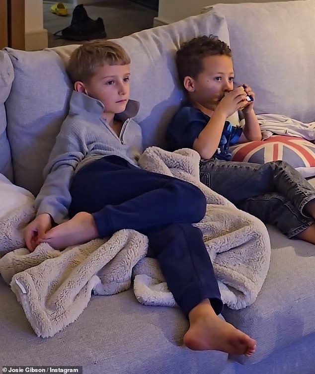 During the video, Josie's son can be seen relaxing on the couch with his family members as he patiently waits for the singer to reveal himself.