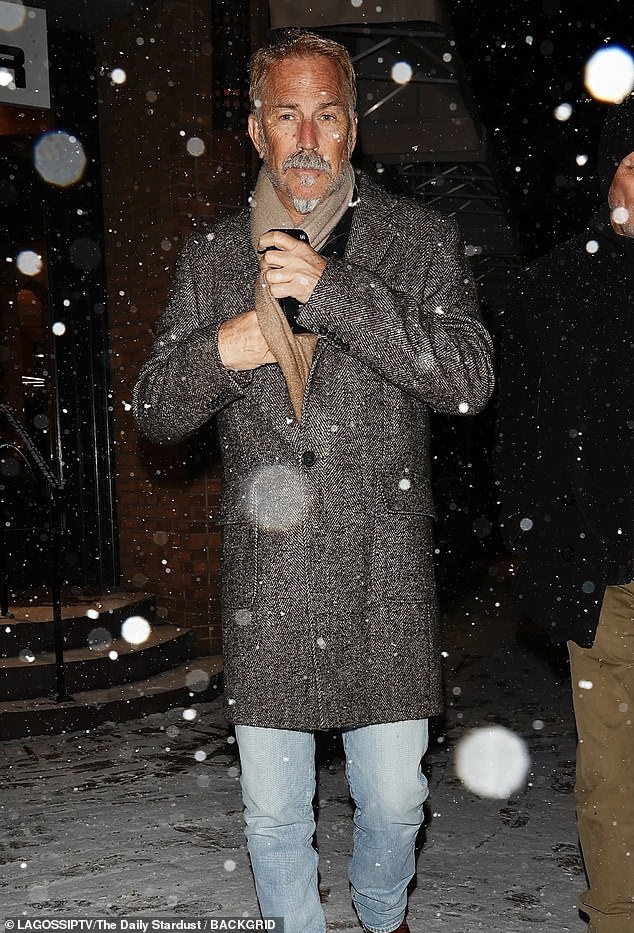 The Yellowstone star, 69, wore a long black and gray coat with a beige scarf, blue jeans and crocodile boots as she left a restaurant with friends. He had a fresh tan and a well-groomed silver fox goatee.