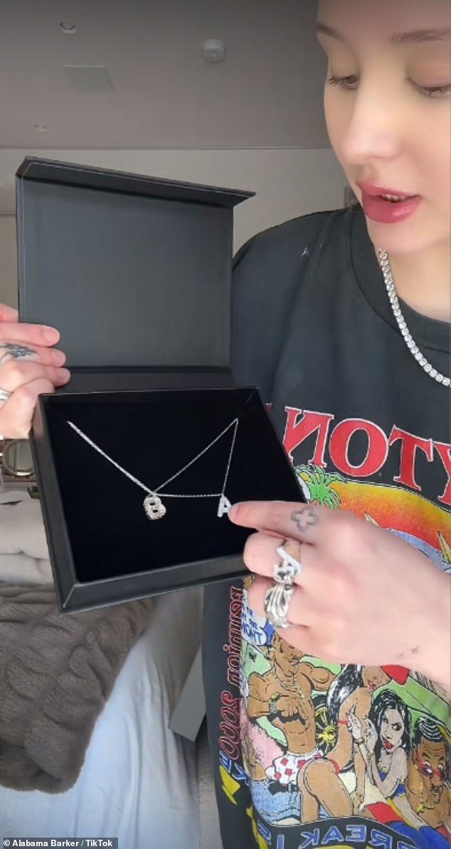 The diamond necklace above with her initials was a gift from her sister.