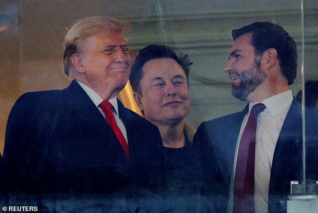 Trump is joined by Tesla and SpaceX CEO and proposed DOGE committee co-chairman Elon Musk at the Army-Navy game