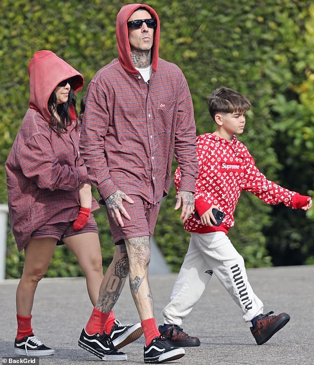 A couple days after Christmas, the couple kept the holiday cheer alive with coordinated sets of red clothing.