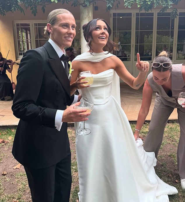 Kerr's Matildas teammate Emily Van Egmond (left) was all smiles after marrying teammate Kat Thompson.