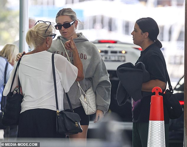 Sam kept it low profile in a black t-shirt and green shorts, which he wore with a black hoodie as he arrived for his flight.