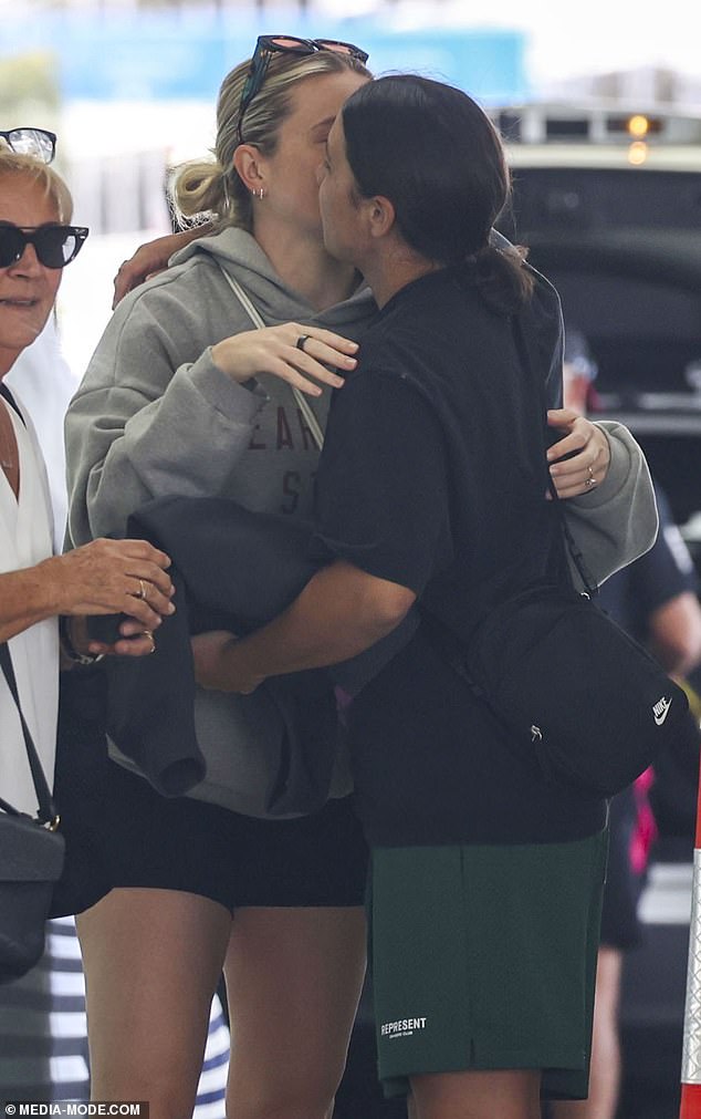 Sam was seen kissing Kristie on the cheek as they said goodbye before the flight.