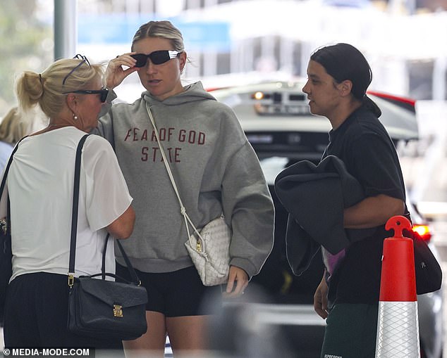 Kristie was seen giving some kind words to the family as they all talked outside the airport before the flight.