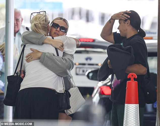 Sam looked somber during the outing as everyone prepared to fly back to Perth to gather around Coral.