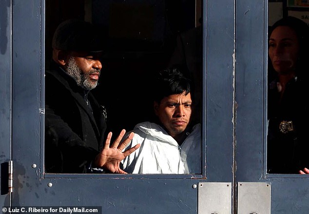 Zapeta-Calil, who has been held without bail since his arrest following the horrific incident, waived his right to appear in court on Friday. Pictured: Detectives from the NYPD 60th Precinct walk accused firebug Zapeta-Calil out of the building