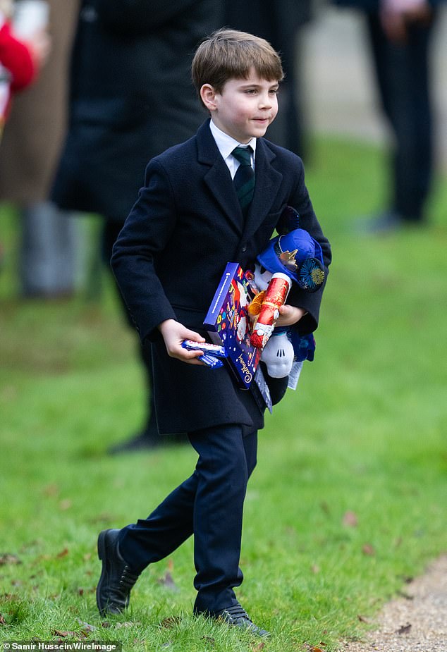 Prince Louis couldn't contain his excitement as he collected all his Christmas presents from well-wishers.