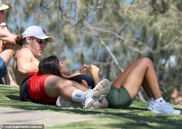 They weren't afraid to pack on the PDA either, and the pair, over a pint, stopped to rest on a patch of grass.