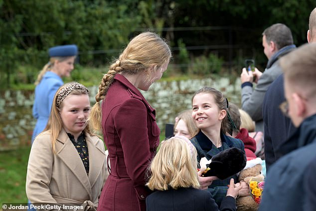 The teenager spoiled her relatives during the Christmas Day service at St Mary Magdalene Church on the Norfolk estate this week.