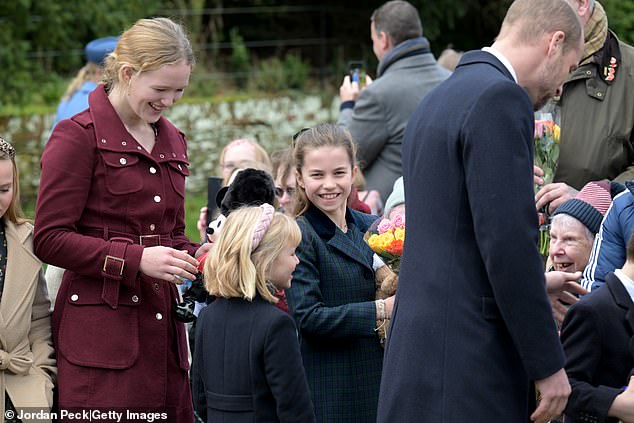 Matching her aunt Zara Tindall, Savannah, who was Queen Elizabeth's first great-granddaughter, looked smart and stylish in a burgundy coat as she smiled and chatted with her family members.