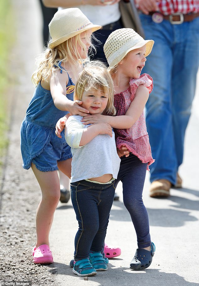 Smiling sisters Phillips and Mia pictured attending the Badminton Horse Trials together in 2016.