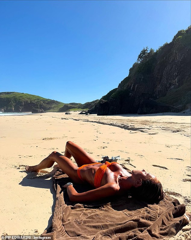 In photos shared on Instagram, Pip smiled as she slipped off her jean shorts and into an orange bikini. Then he lay down on a towel on the deserted beach.