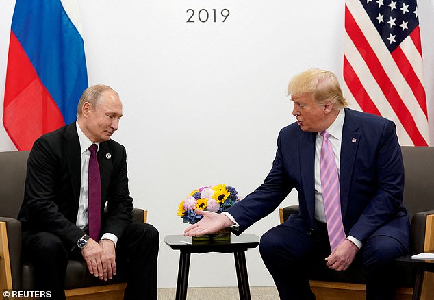 There are fears that Putin would never stick to a peace deal proposed by new US President Donald Trump (both pictured together in 2019)