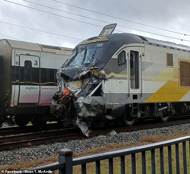 A witness to the collision said it appeared the fire truck driver drove the truck around the lowered railroad crossing, unaware that a train was coming onto the tracks from the opposite direction.