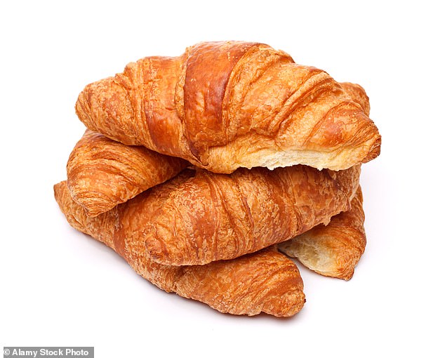 A pile of freshly baked croissants (file image). The study suggests that eating breakfast can reduce inflammation that can build up in the body overnight and affect muscle strength.