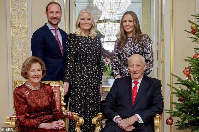 Høiby was noticeably absent from the family's Christmas card this year (pictured, left to right: Crown Prince Haakon, Crown Princess Mette-Marit and Princess Ingrid Alexandra with Queen Sonja and King Harold)