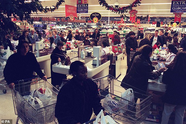 Shoppers take advantage of round-the-clock shopping at the Tesco hypermarket in Brent Cross in the early hours of the morning