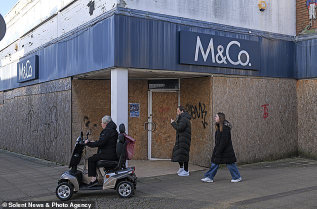 WATERLOOVILLE: Boarded-up Wellington Way shopping center just off main street