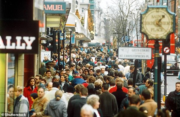 Oxford Street has always been the ideal place for Christmas shopping, but not if you want to avoid the crowds. Photographed in 1993