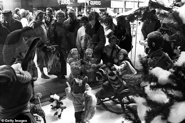 Young children stare wide-eyed at Fenwick's window display in November 1987.