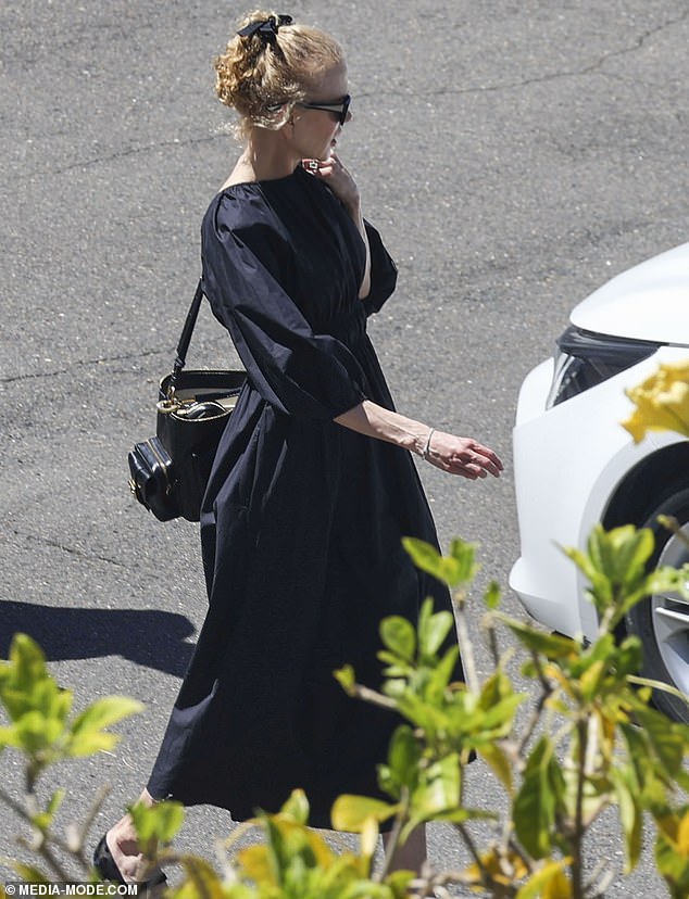 The actress appeared for the Sunday service at Sydney's North Chapel and appeared to go alone, with her children not seen in tow.