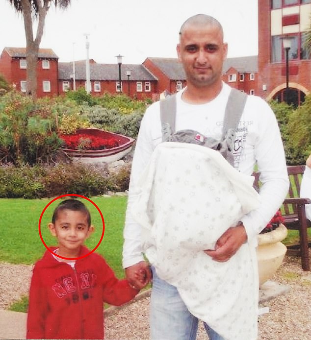 Sukhjeet Singh with his son Arjun in India in 2024. Now 17, he asked MailOnline to use only childhood photos of him for this article so he can rebuild his life.