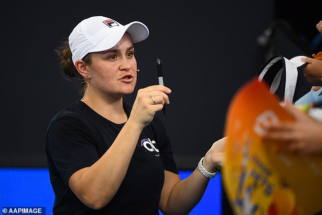 The 28-year-old stayed courtside to sign autographs for fans inside Pat Rafter Stadium.