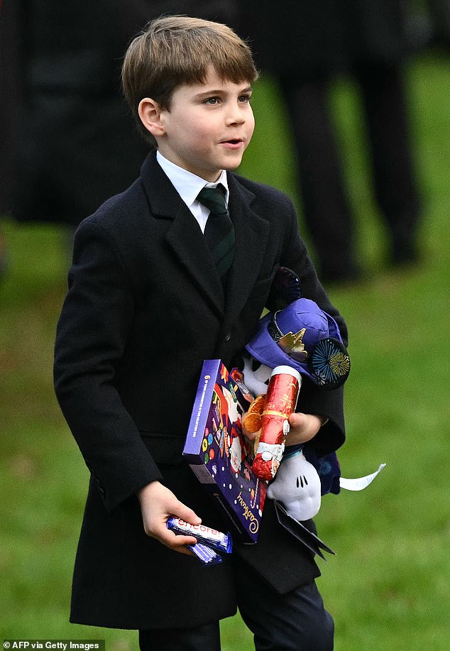 Prince Louis, six, couldn't contain his joy as the young royal accepted boxes of Cadbury chocolates and stuffed animals from royal fans at Sandringham on Christmas morning.