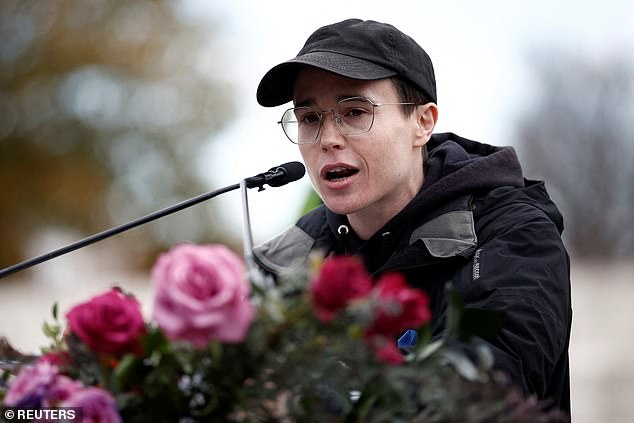 Many online users quickly noticed that the actor spoke in a dull manner and seemed sad, leading them to believe that he is truly unhappy with his transition. (Pictured: Page speaking in front of the US Supreme Court on December 8)