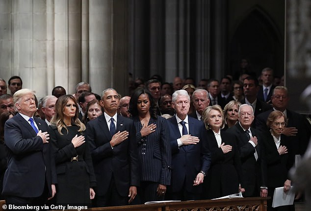 The Washington portion of the state funeral takes place at the Washington National Cathedral. Presidents Trump, Obama, Clinton, Carter and Biden are all pictured at George HW Bush's funeral in 2018