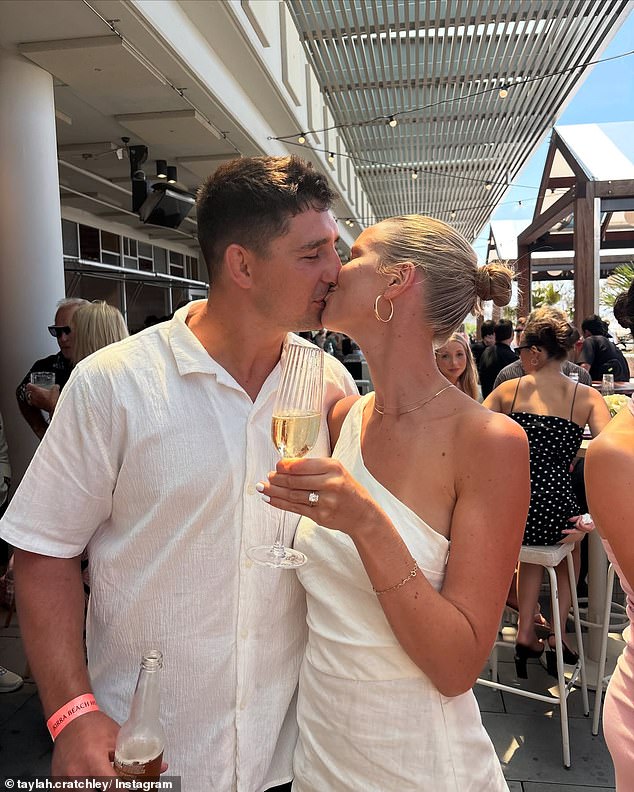 The couple shared a sweet photo that showed them stealing a kiss amid the engagement celebrations.