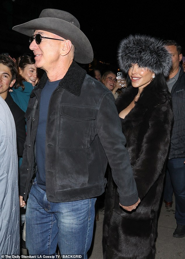 The soon-to-be husband and wife, who hosted a star-studded dinner party the night before, held hands as they strolled together, with Sanchez sporting a glamorous leather suit.