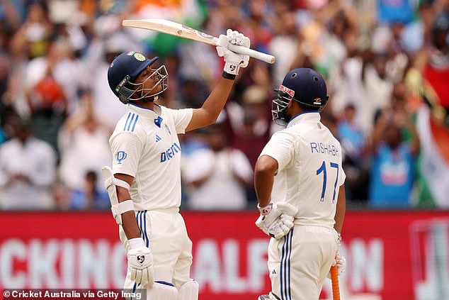 Jaiswal is pictured waving to the crowd after rubbing salt in Australia's wounds by registering a timely half-century on Monday.