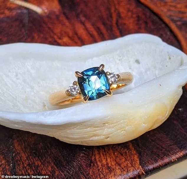 Drew proposed to Sam with a stunning sapphire and diamond sparkler.