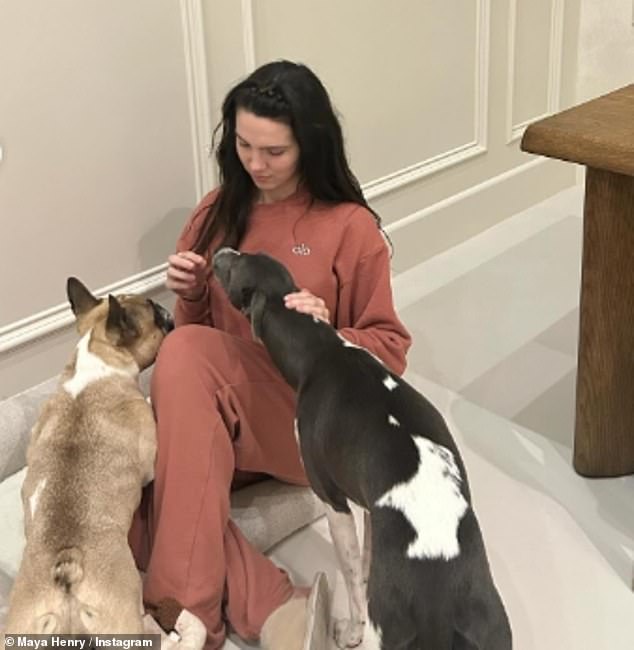 She also spent a lot of time with her dogs this year and shared a photo with them as part of the album.