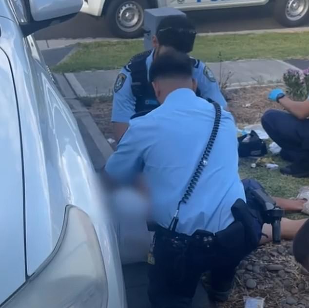 On Monday, detectives revealed that Khou (pictured on the ground) had links to Asian criminal gangs and was a known target for underworld rivals.