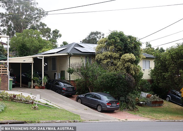 Three cars were parked in the driveway of Campos' home on Monday (above), but a woman who spoke through the front door said no one inside wanted to talk.