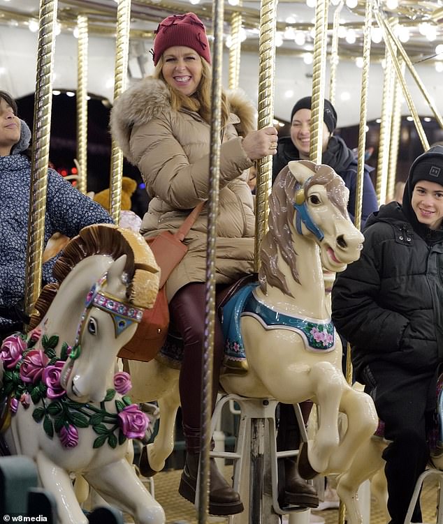 Kate bundled up in a beige quilted jacket and pink hat, while Darcey wore stylish earmuffs.