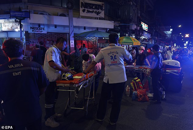 Thai rescuers helped 40 people from the roof of the building.