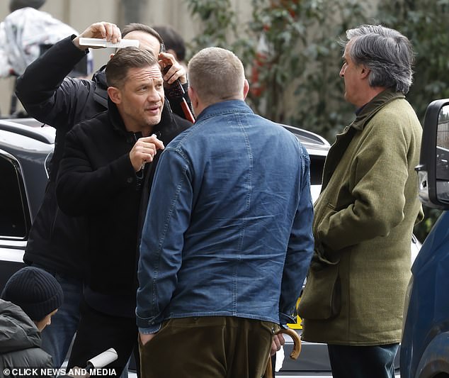 Old friends Tom and Guy were spotted filming together on the streets of London on Saturday.