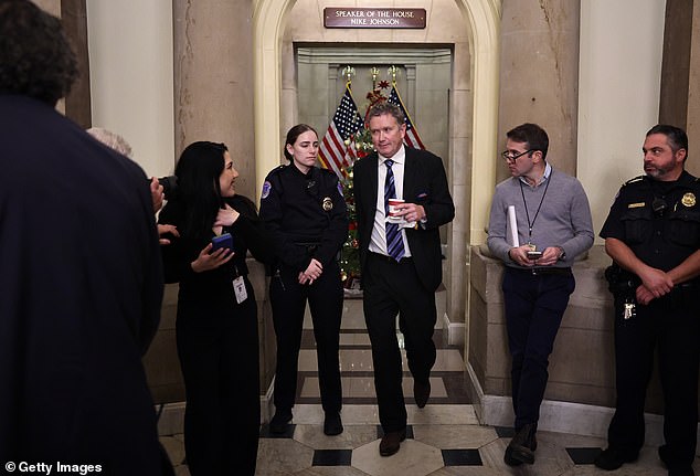 Rep. Thomas Massie, R-Ky., leaves Chairman Mike Johnson's office. He told DailyMail.com that he would not vote for Johnson's re-election as speaker