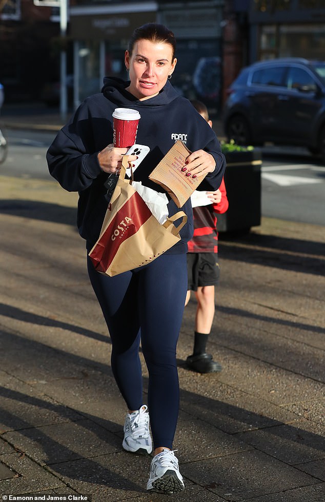 The I'm A Celeb star cut a casual figure for the outing in a navy blue hoodie which she teamed with matching leggings.