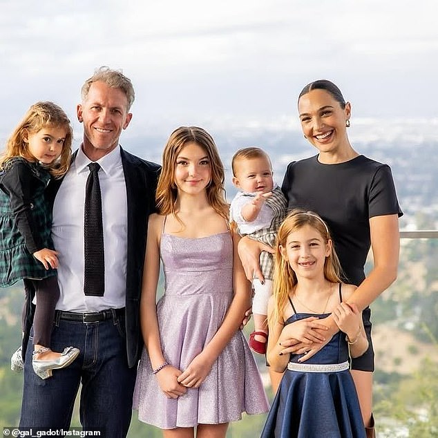 Gadot, pictured here with her husband and four daughters, said she has made a full recovery from the ordeal and is warning other women to look out for the signs